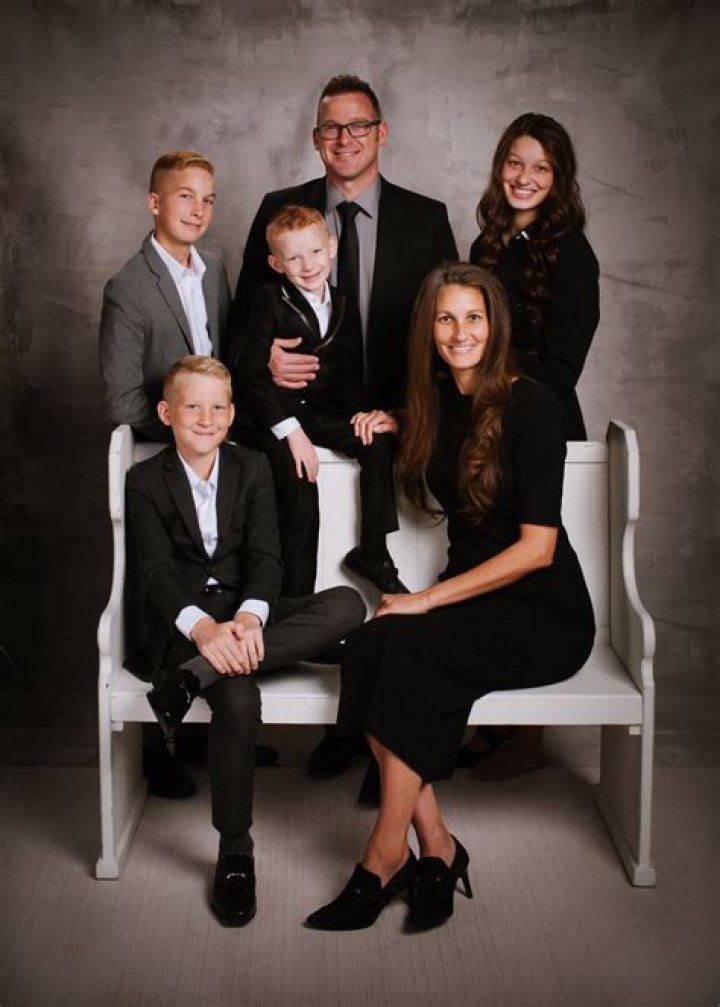 A Family Portrait Of Their Kids