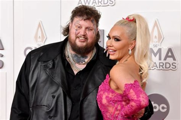 Breathtaking Picture Of Jelly Roll And His Beautiful Wife