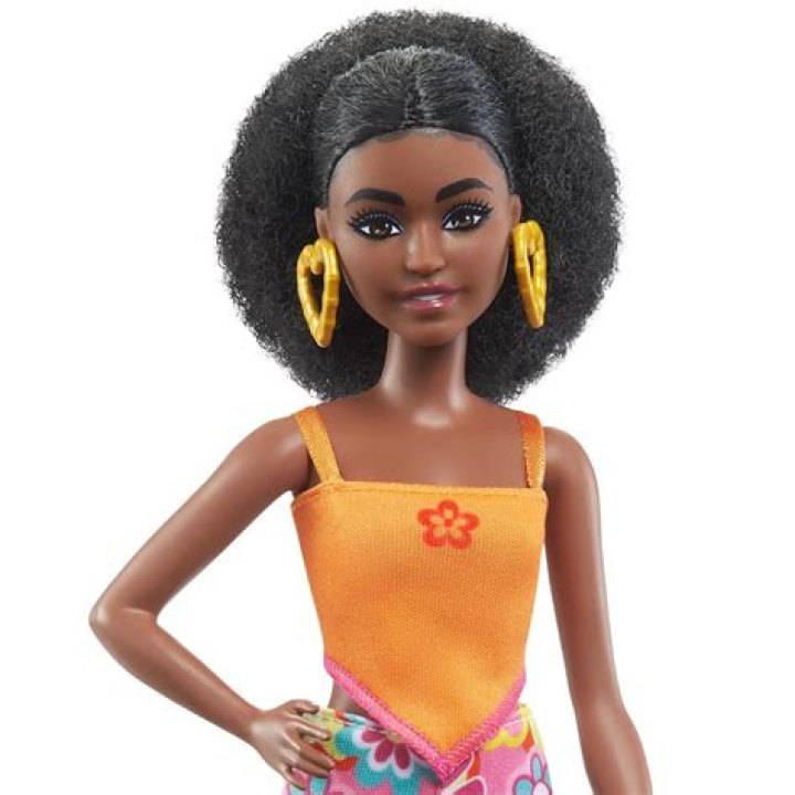 Discover Unforgettable Black Barbie Dolls: Timeless And Inspiring