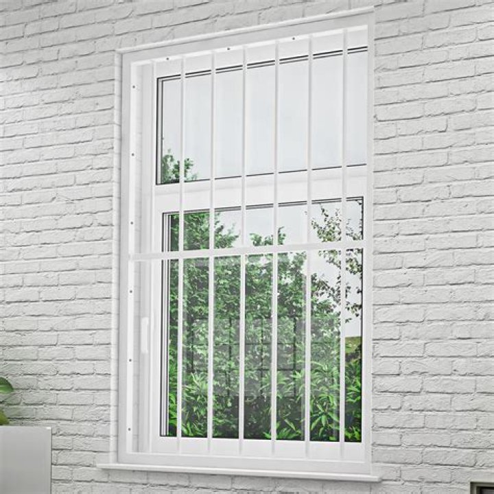 Modern White Window Bars: Enhance Your Home's Style And Security