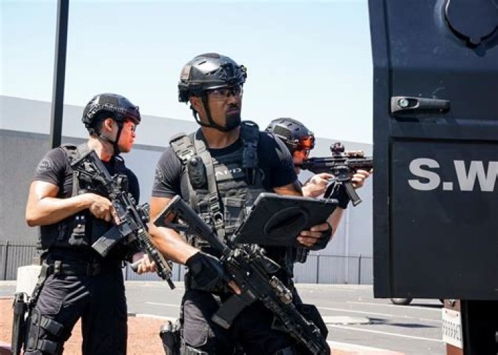 S.W.A.T. actor ___ Russell ·