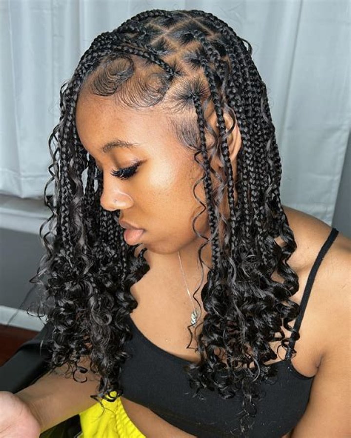 Uncover The Enchanting World Of Curly Braid Hairstyles