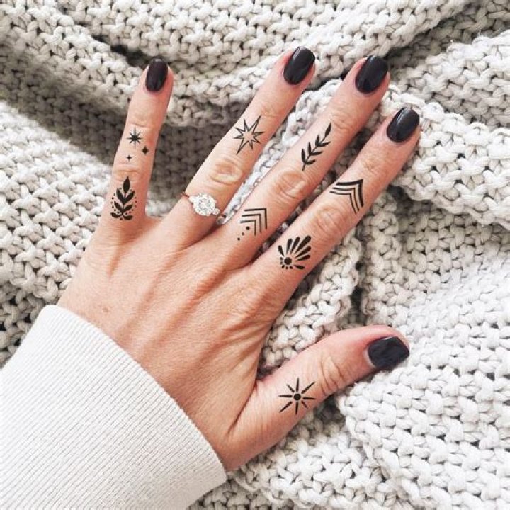 Unveiling The Allure Of Classy Women's Finger Tattoos